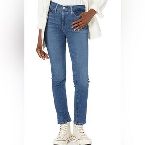 Levi’s PREMIUM 312 Shaping Slim medium wash jeans in 31 LONG